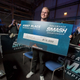 Armada presented with a check for his winnings from the tournament.